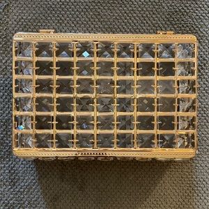 Glass crystal gold metal jewelry box with velvet interior. Has 5 interior areas.